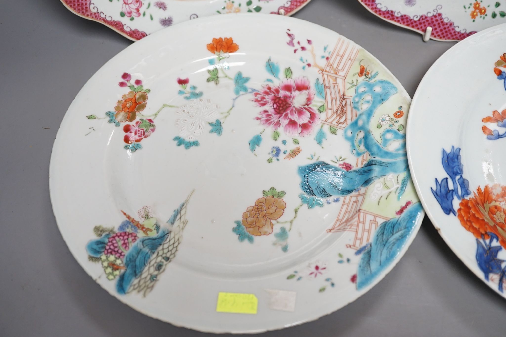 Two pairs of 18th century Chinese famille rose plates and an Imari plate, 26cm